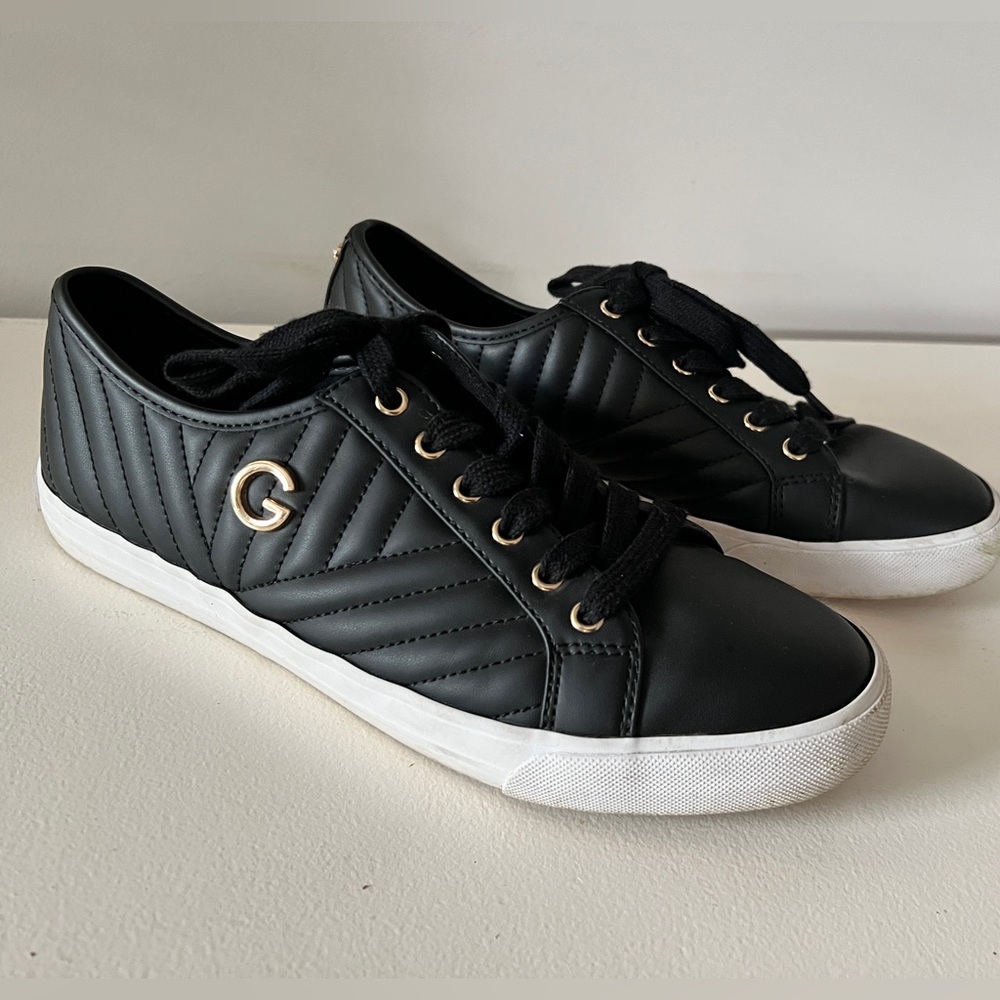 Black CBG sneakers with gold decals